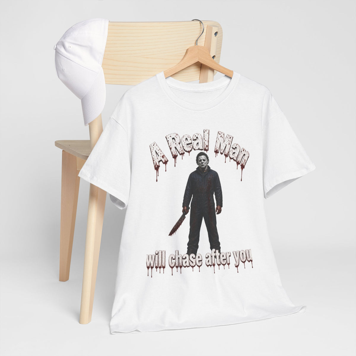Horror Graphic Tee — "A Real Man Will Chase After You" Michael Myers Shirt